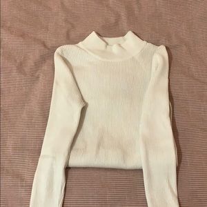 White ripped mock neck sweater